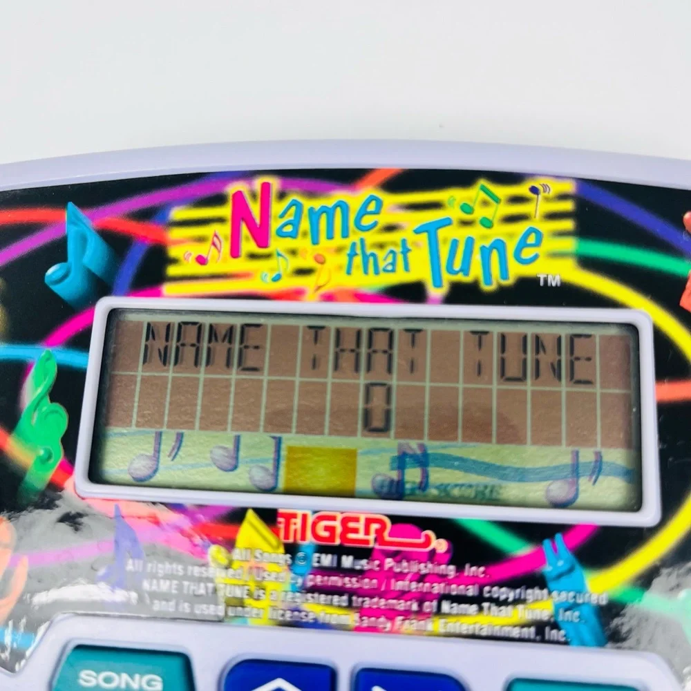 Tiger Name That Tune Electronic Handheld Game Pop Hits 60s-90s Tunes 1997 VTG